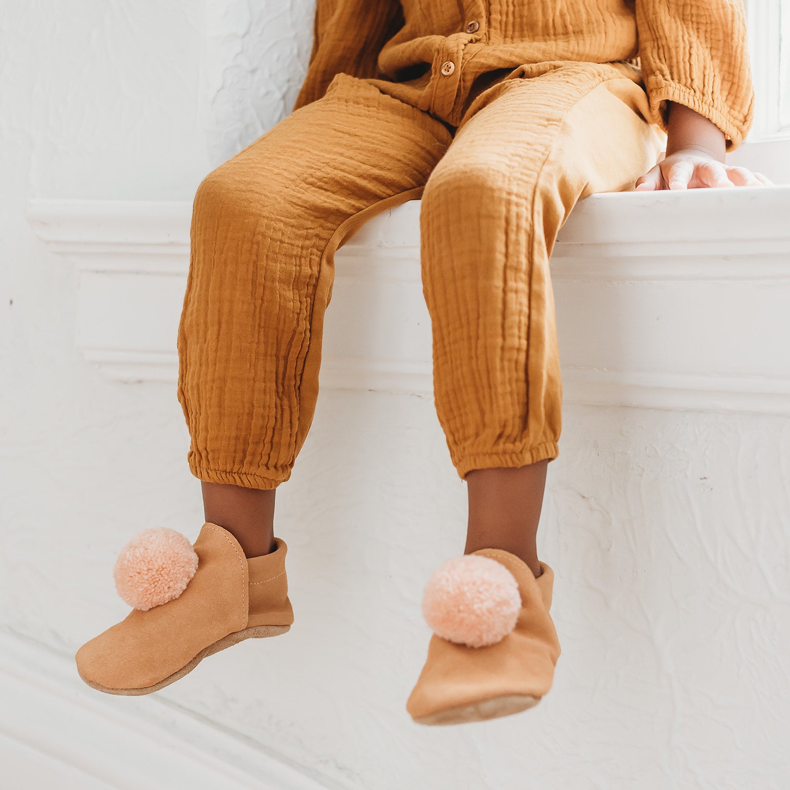 size 10/11 (7") wool pompom shoes - peachy pink